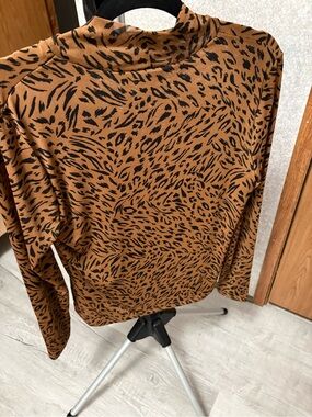 Animal Print Mock Neck Top in Brown and Black. By A new day.